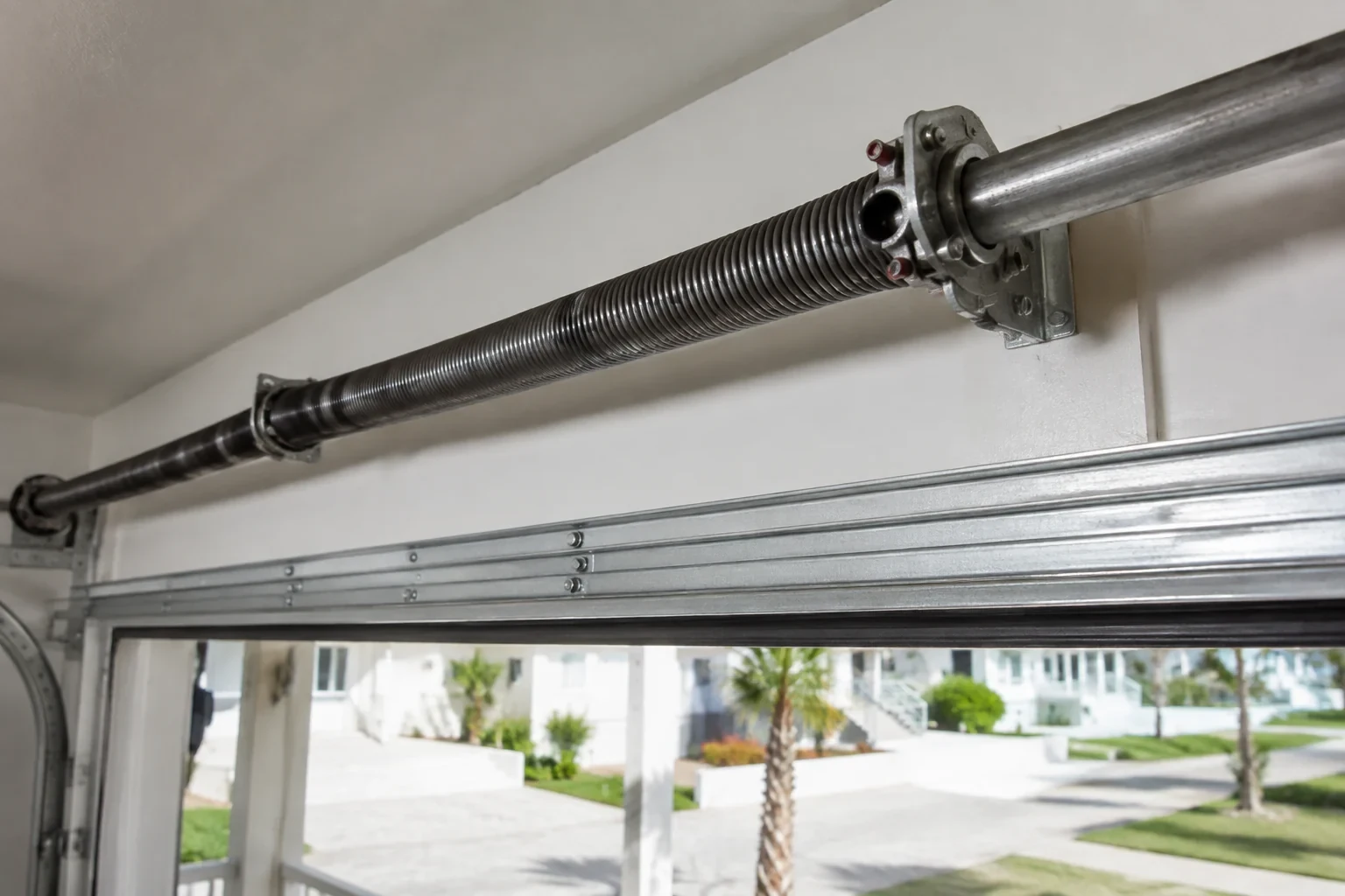 Coiled springs on an overhead garage-door shaft